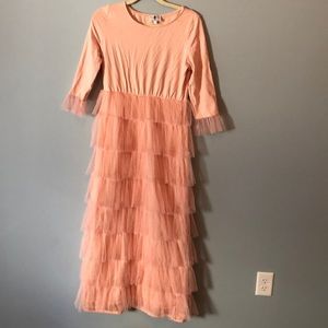 Dainty Jewell’s blush dress